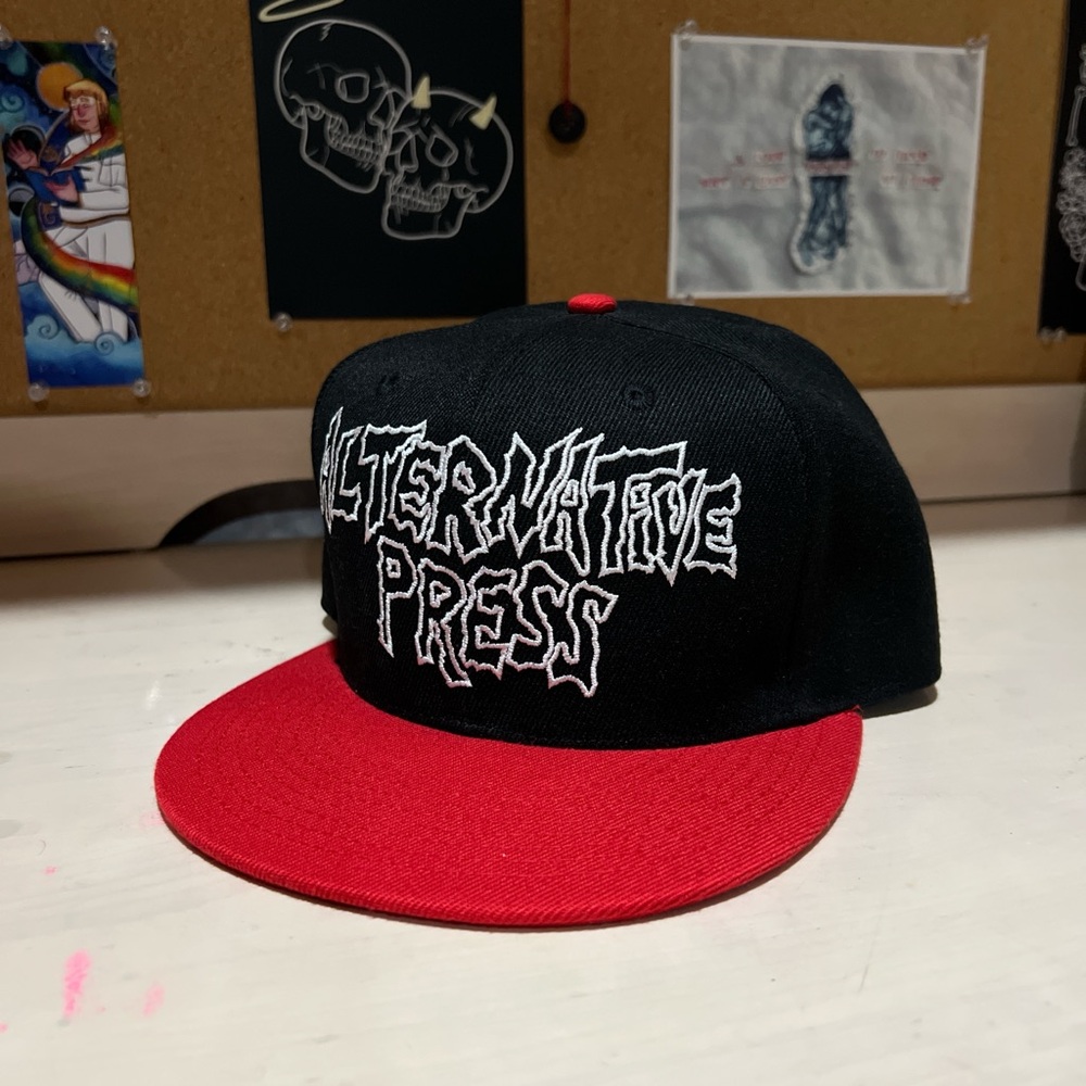Alternative Press red and black snapback
